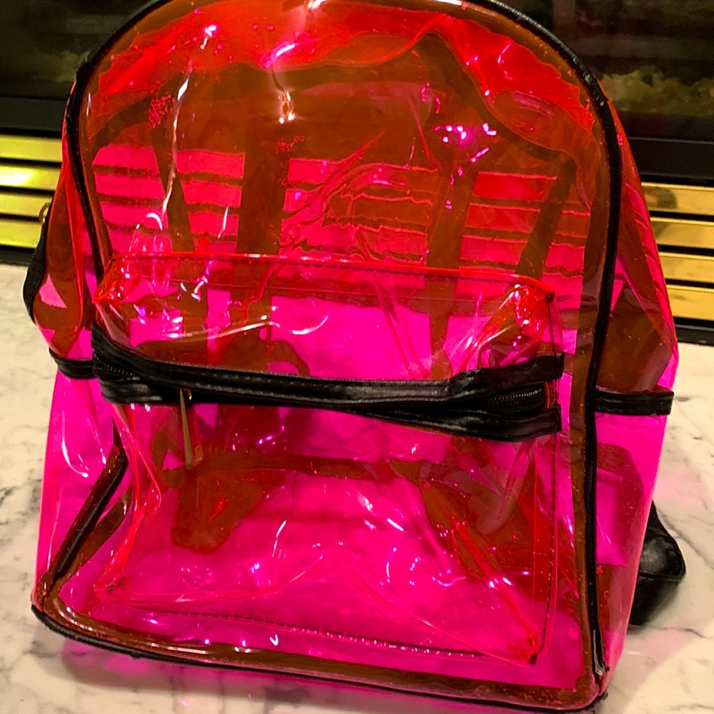Pink plastic book bag